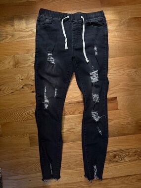 Women’s Distressed Black Drawstring Jeans